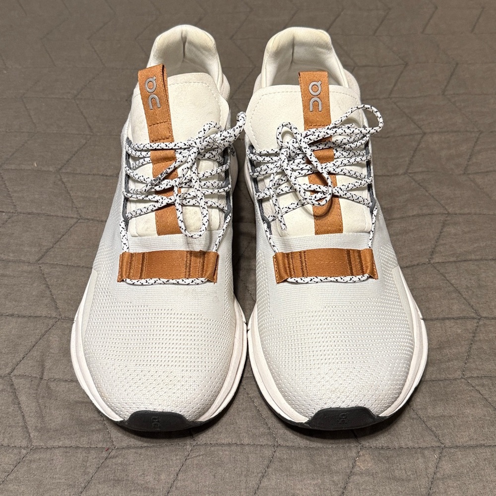 On Running Cream and Brown Sneakers
